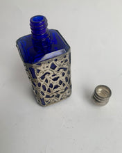 Load image into Gallery viewer, Stylish Vintage Art Nouveau Cobalt Blue Glass and Pewter Filigree overlay Perfume Bottle
