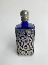 Load image into Gallery viewer, Stylish Vintage Art Nouveau Cobalt Blue Glass and Pewter Filigree overlay Perfume Bottle
