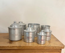 Load image into Gallery viewer, Vintage Set of 7 1950s French Aluminum Storage Canisters - Freya&#39;s Trading Post
