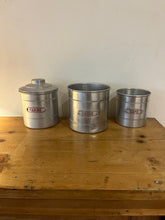 Load image into Gallery viewer, Vintage Set of 7 1950s French Aluminum Storage Canisters - Freya&#39;s Trading Post
